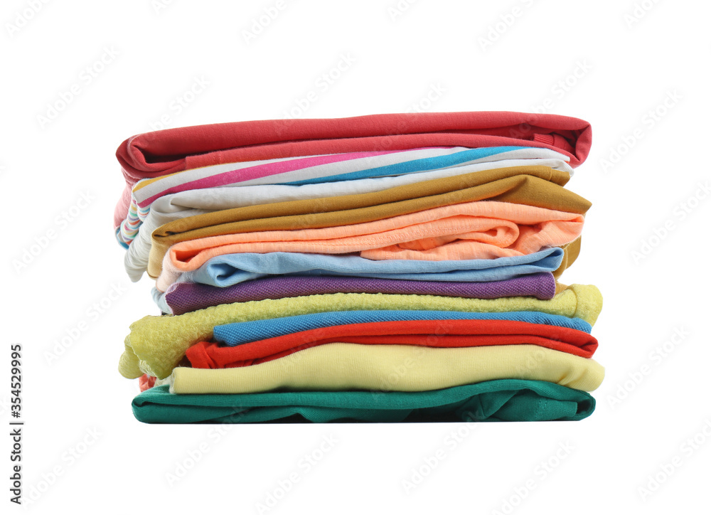 Stack of folded clothes isolated on white Stack of folded clothes isolated on white