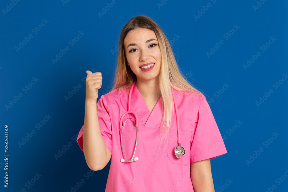 Blonde doctor with pink uniform Blonde doctor with pink uniform