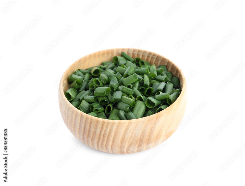 Cut green spring onion in wooden bowl isolated on white Cut green spring onion in wooden bowl isolated on white