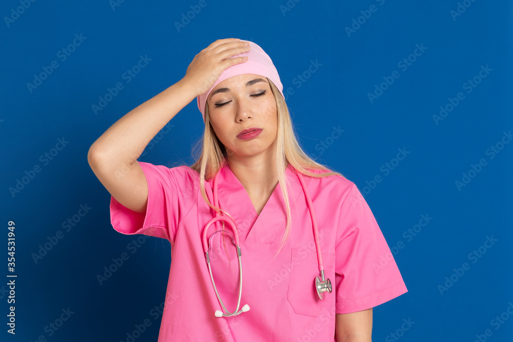 Young doctor with a pink uniform and a scarf Young doctor with a pink uniform and a scarf