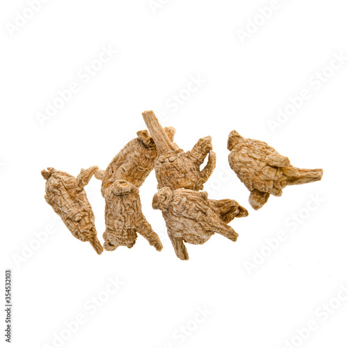Ginseng or Dried Ginseng on a background new. © heinteh