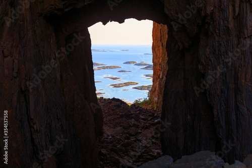 View through a hole in the mountain in Norway  Torghatten
