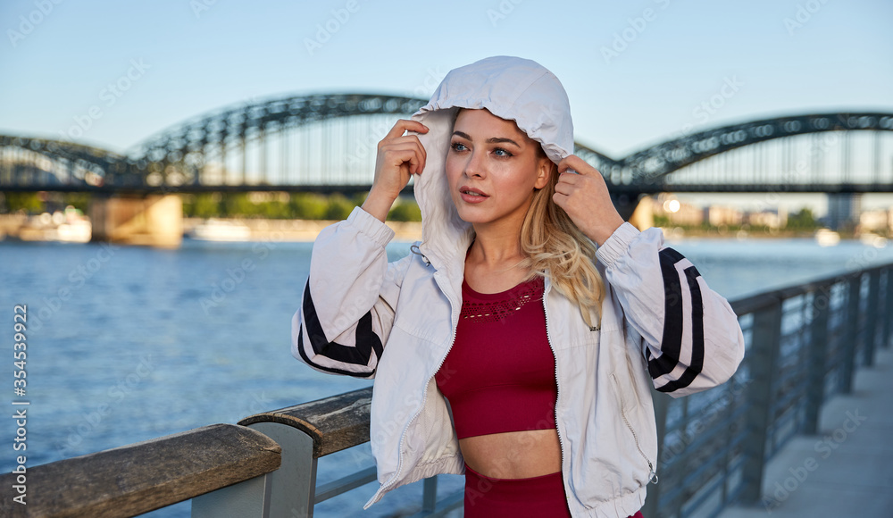 Young attractive woman ready for the early morning outdoor workouts Young attractive woman ready for the early morning outdoor workouts