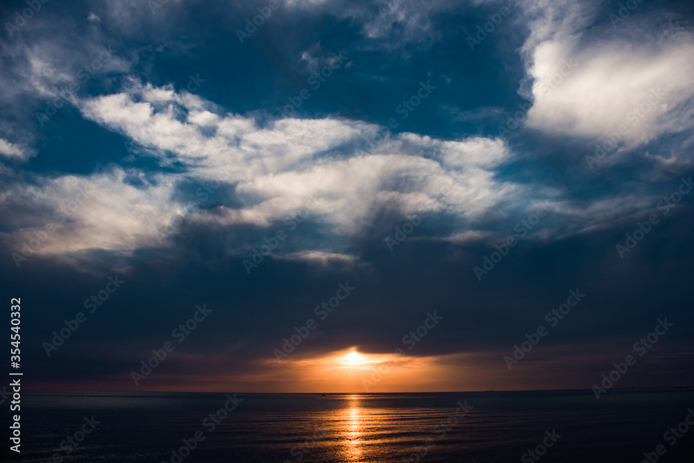 seascape with sunset and clouds view seascape with sunset and clouds view