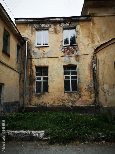 windows in a dilapidated house, an old building has not yet been empty © Kirill