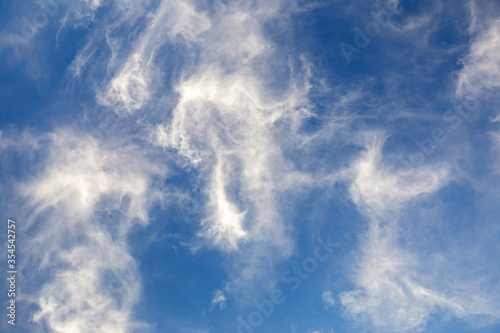 Blue sky with heavenly whit...