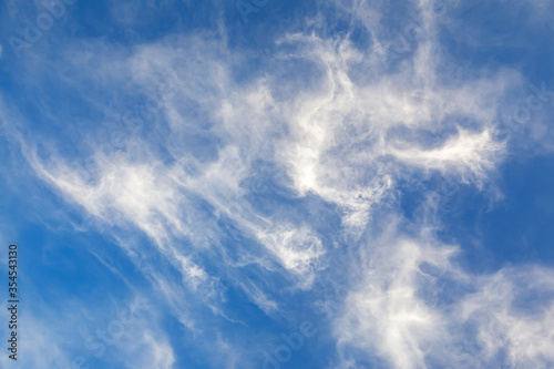 Blue sky with heavenly whit...