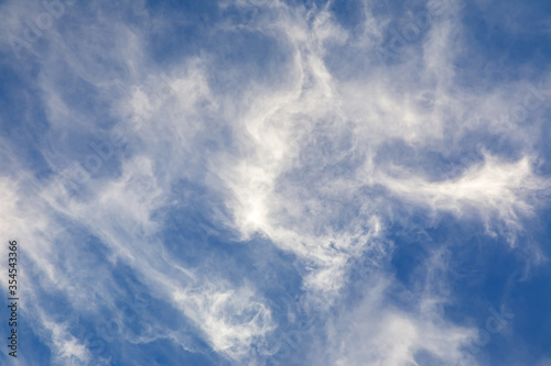 Blue sky with heavenly whit...