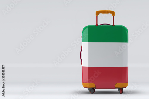 Italy flag on a stylish suitcases back view on color background. Space for text. International travel and tourism concept. 3D rendering.