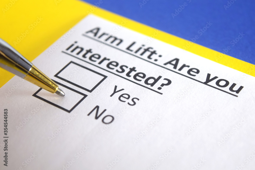 One person is answering question about arm lift. One person is answering question about arm lift.