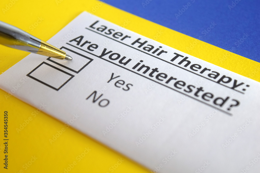 One person is answering question about laser hair therapy.