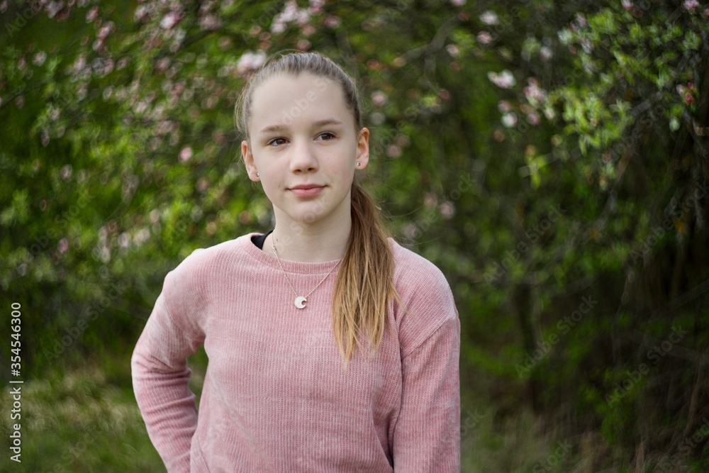 Young teenage teen girl in nature in the countryside summer portrait. Young teenage teen girl in nature in the countryside summer portrait.