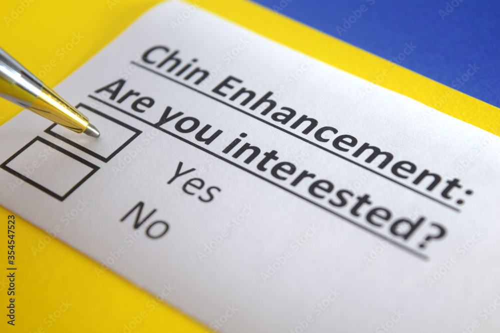 One person is answering question about chin enhancement. One person is answering question about chin enhancement.