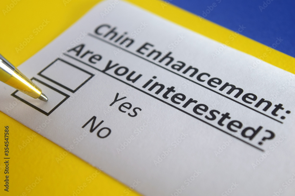 One person is answering question about chin enhancement. One person is answering question about chin enhancement.