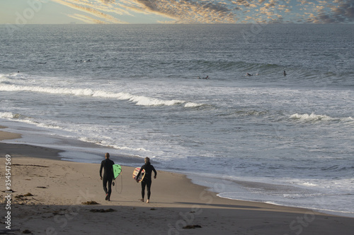 Photography Early morning surfing at Rincon point in California
