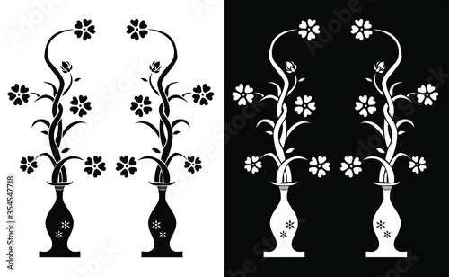 Decorated Flower vase with beautiful vines, leaves and flowers is in black and white background