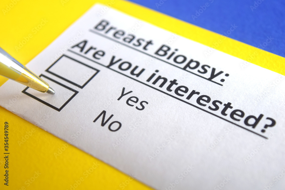 One person is answering question about breast biopsy. One person is answering question about breast biopsy.