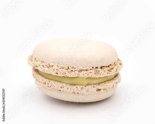 Colorful vanilla macaroon on white background. clipping path