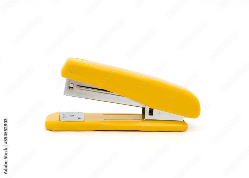 A yellow stapler on white background. Clipping path A yellow stapler on white background. Clipping path