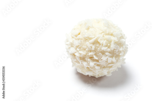 Homemade White Candy With Coconut Topping On White Background. copy space.