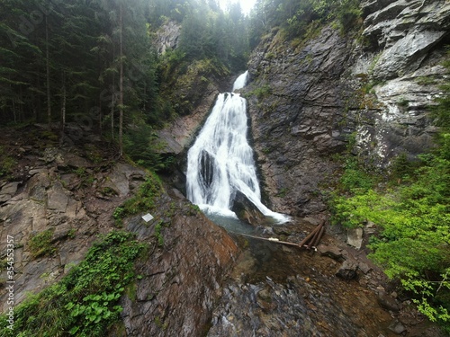 Aerial view of Rachitele waterfall , on the eastern side of Vladeasa mountain photo