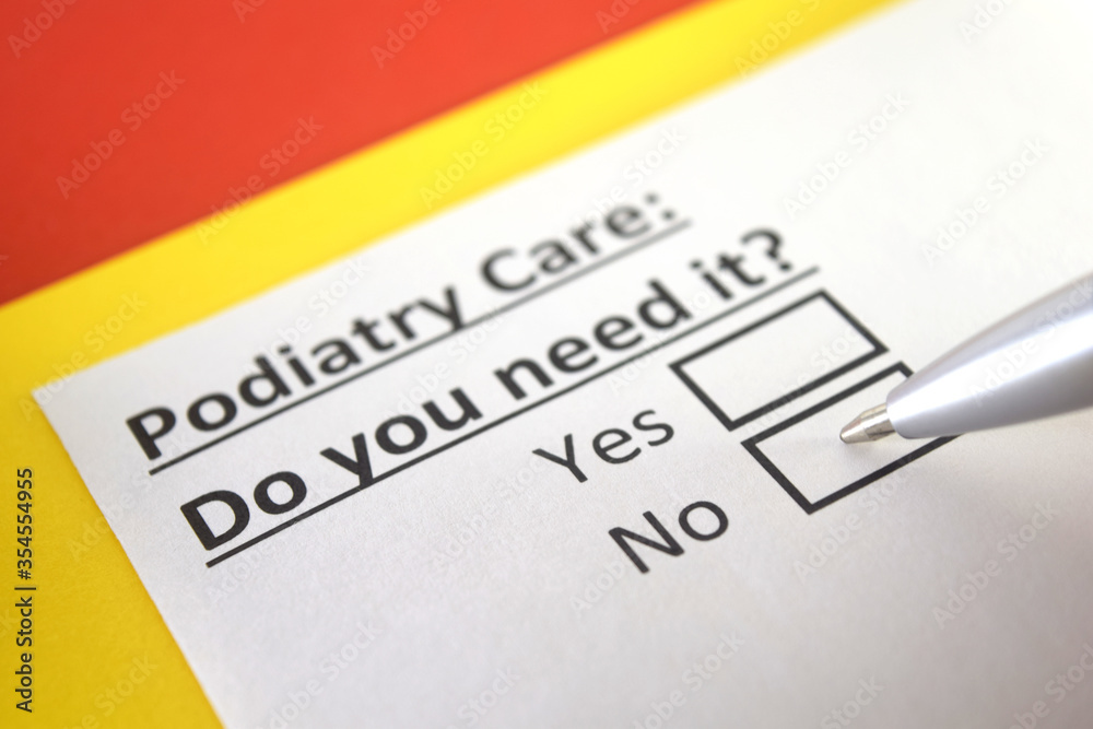 Fototapeta premium One person is answering question about podiatry care.