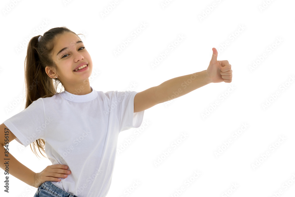Emotional little girl in a clean white T-shirt. Emotional little girl in a clean white T-shirt.