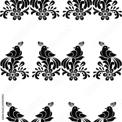 Black and white peacocks with flowers is in Seamless pattern
