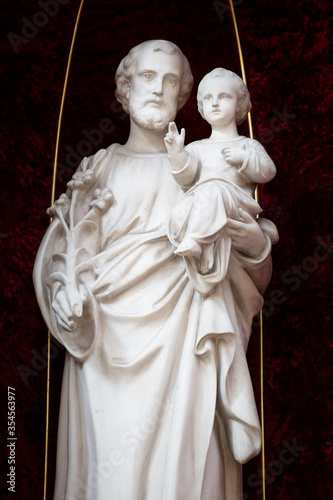 Fotografie Saint Joseph with Jesus savior marble sculpture