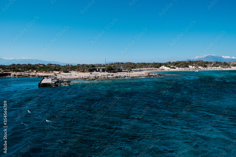 boats in the bay of crete