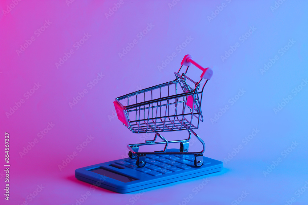 Shoping trolley with calculator in trendy neon light. Gradient pink-blue glow. Concept art. Minimalism