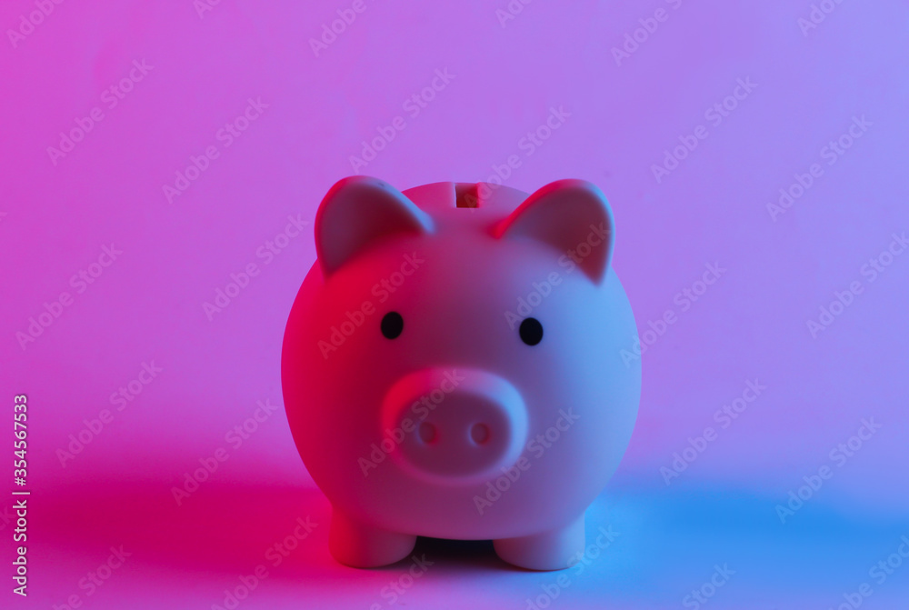 Piggy bank in trendy neon light. Gradient pink-blue glow. Concept art. Minimalism