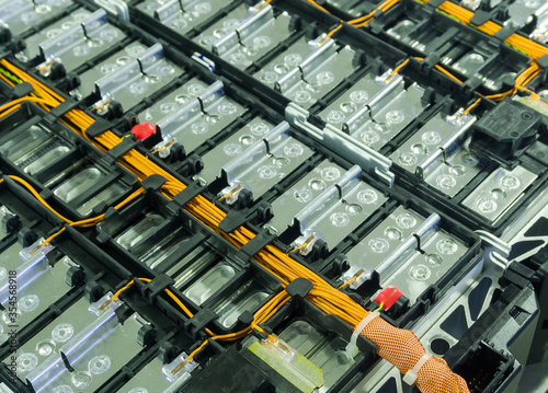 Fotografie Selective focus of Electric car lithium battery pack and wiring connections internal between cells on background