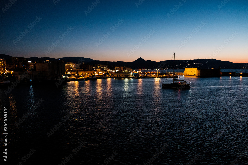 night view of the port of crete