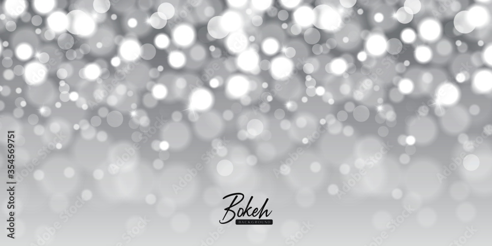 Fototapeta premium Abstract background with bokeh effect. Blurred defocused lights in white colors. Vector illustration.