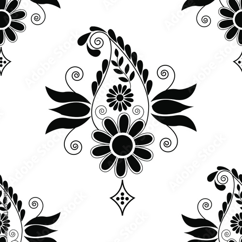 Black and white paisley design decorated with flower petals and spirals is in Seamless pattern