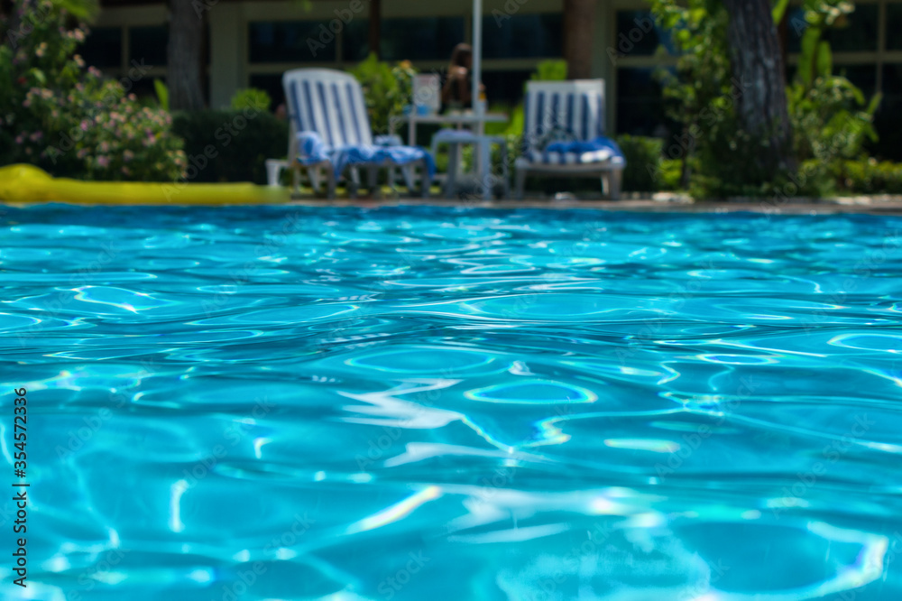 Beautiful swimming pool in hotel pool resort.