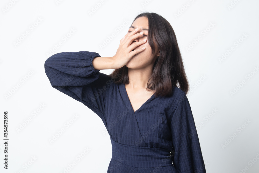 Sleepy young Asian woman yawn. Sleepy young Asian woman yawn.