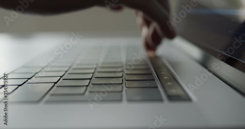 Using touchbar on a modern laptop notebook device
 photo