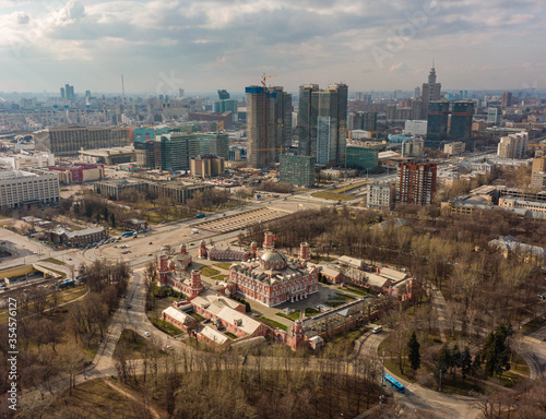 View from above of the streets of the city of Moscow and the old traveling palace of Vasily III, aerial photography
