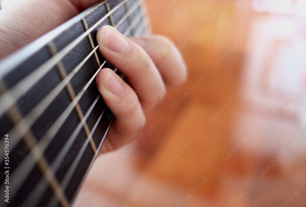 Fototapeta premium hand playing guitar