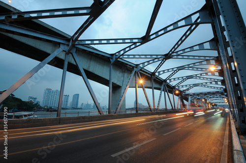metal and concrete bridge at twilight  © speedfoto