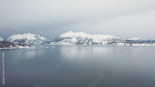 Wallpaper Mural Landscapes of winter Norway. Coast. Ferry service. Mountains and fjords in Norway in winter. Ship on the water. Panoramic view. Aerial photography. Torontodigital.ca