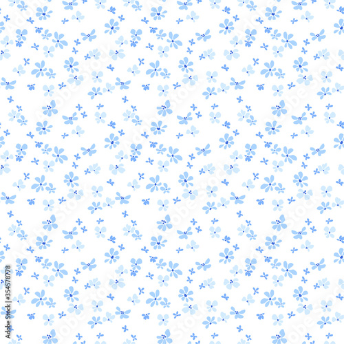 Vector seamless pattern. Pretty pattern in small flower. Small light blue flowers. White background. Ditsy floral background. The elegant the template for fashion prints.