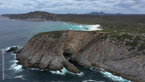 Orbital drone view overlooking large cliffs at Cave Point in Western Australia photo