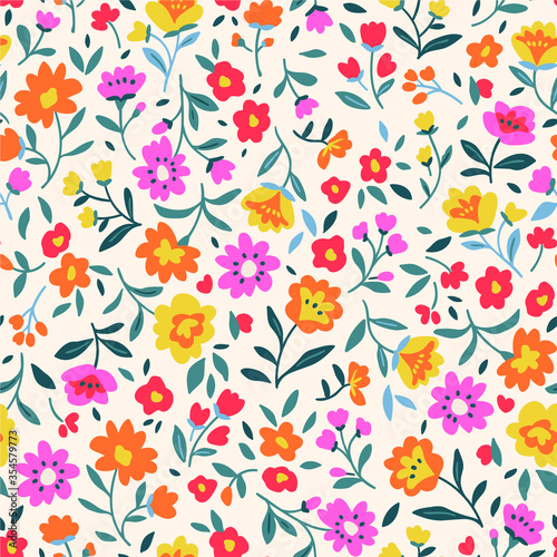 Floral pattern. Pretty flowers on white background. Printing with small yellow and pink flowers. Ditsy print. Seamless vector texture. Spring bouquet.
