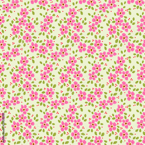 Vector seamless pattern. Pretty pattern in small flower. Small pink flowers. Pale green background. Ditsy floral background. The elegant the template for fashion prints.