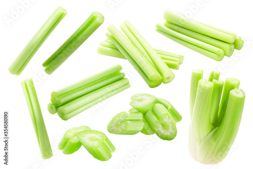 Celery stalks cut and chopped isolated w clipping paths. Apium graveolens petioles