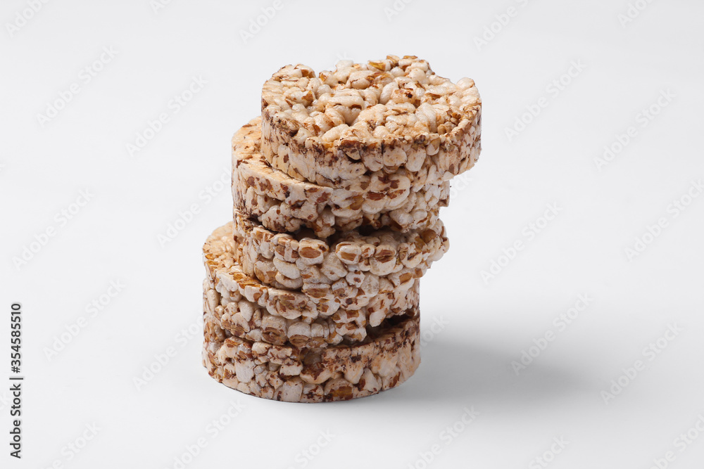 Stack of Whole grain crispbreads on white background Stack of Whole grain crispbreads on white background