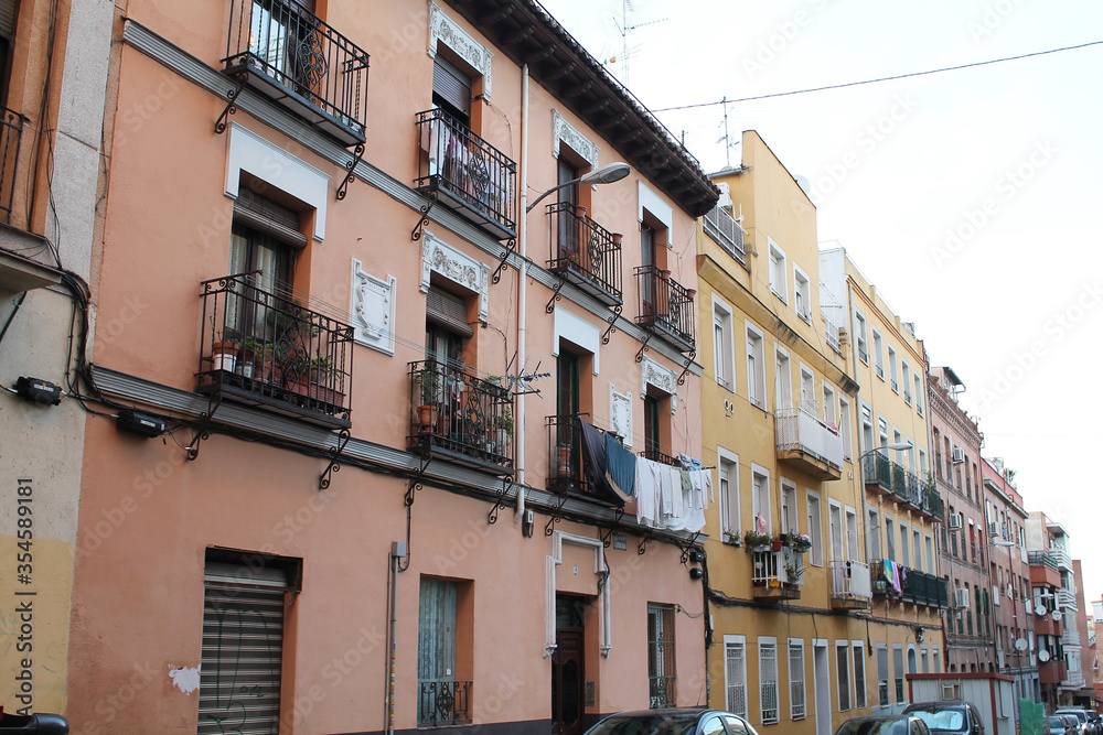 facades of houses with balconies